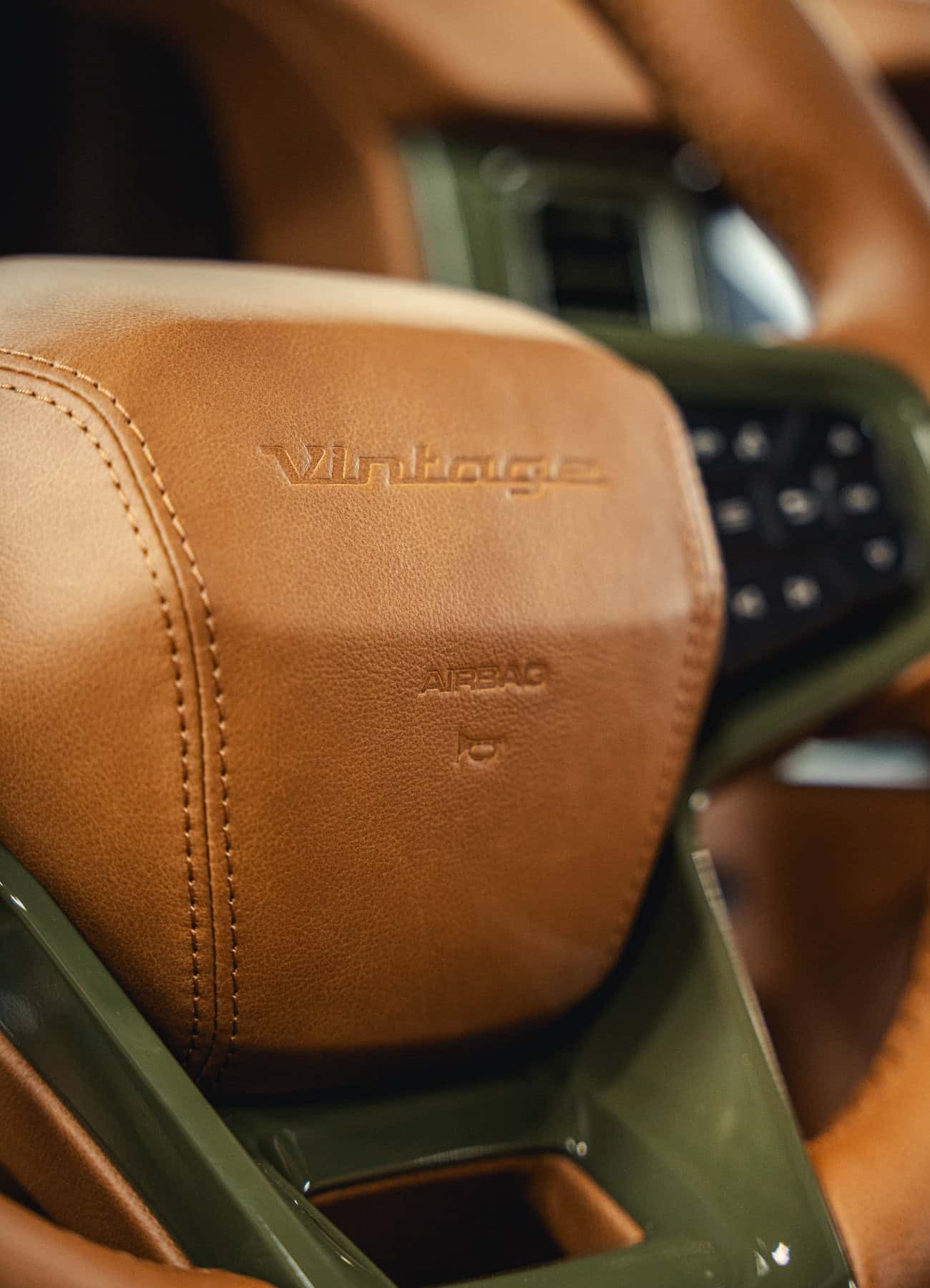 The headrest: Our wordmark, pressed into every seat